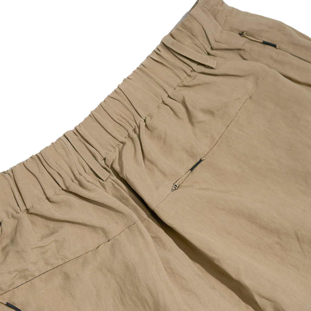 The Relaxed Pleated Tailored Trouser