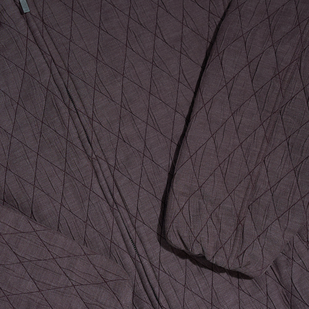 The Diamond-Quilted Zip Jacket